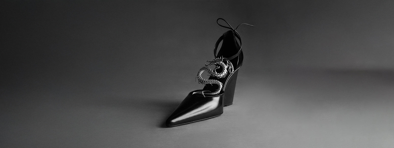 Coperni Dragon Wedge Pumps in black 